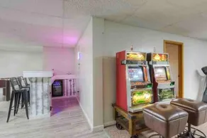 Spacious home with pool bar game room parking on 5 private acres. - Image 2