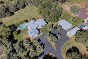 Spacious home with pool bar game room parking on 5 private acres. - Image 4