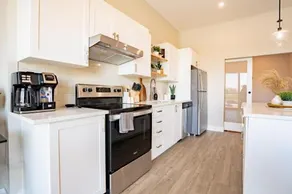 Brand new! Stylish 2 Bedroom Condo - Image 3