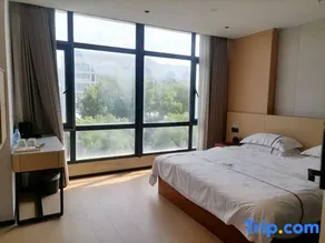 Yanshan Xinride Jingdian Hotel - Image 4