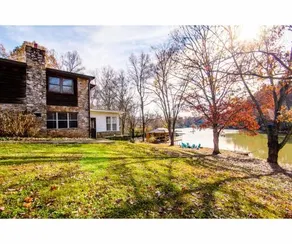 Classic Lake House Lakefront With Fire Pit And Dock - Image 5