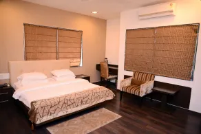 JK Rooms 146 Check Inn Service Apartment - Image 3