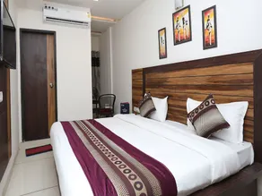Madhuram Landmark By OYO Rooms - Image 2