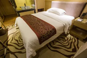 Hotel Xinghe Xiangjiang - Image 4