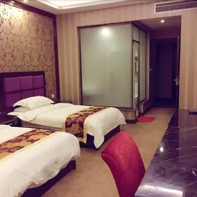 Jiuxi Yihao Business Hotel - Image 4