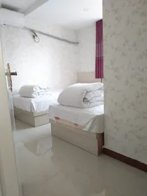 Qufu Xingsheng Hotel - Image 5