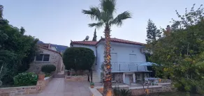 Charming 3-bed House in Tyros - Image 4