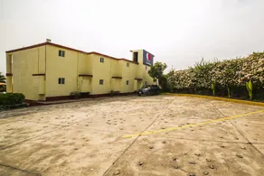 Capital O Hotel Villa Esperanza - Image 4