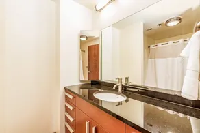 2BR Park Ave Townhome with parking by Cozysuites - Image 2