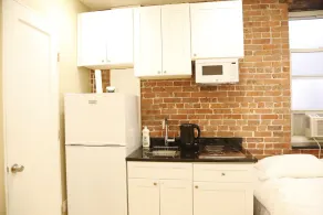 The Nomad Suites & Apartments - Image 2