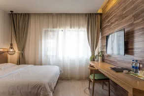 Blossom Hotel In Kunming - Image 5