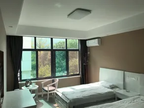 Chang Xing Yuan Zhong Hotel - Image 5