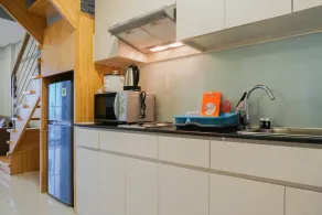 Modern 2BR Apartment Maqna Residence By Travelio - Image 4