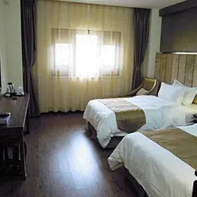 Hexiang Bieyuan Holiday Hotel - Image 5