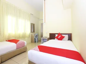 Harmoni Hotel by OYO Rooms - Image 2