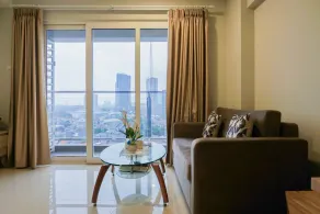 Modern 2BR Apartment Maqna Residence By Travelio - Image 2