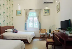 Guxin Hotel - Image 5