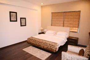 JK Rooms 146 Check Inn Service Apartment - Image 5