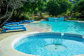 MAWENI BEACH COTTAGES - Image 2