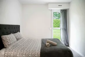 Chic appartement avec terrasse et parking privatif - Image 4