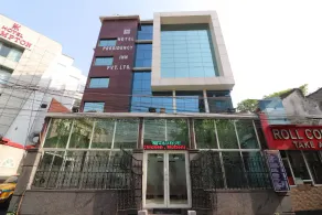 Capital O Hotel Presidency Inn - Image 4