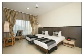 Capital O 697 The Sirona Hotel - Image 3