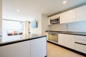 NEW Equipped Condo w GYM Roof - Image 4