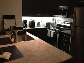 Square One Fully Furnished Suite - Image 5