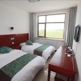 Yijie Holiday Chain Hotel - Image 4