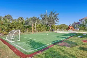 Lavish 8 Br Estate with Pool & Courts - Image 2