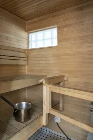 2ndhomes Luminous 2BR Loft House w Sauna - Image 4