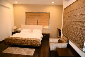 JK Rooms 146 Check Inn Service Apartment - Image 4
