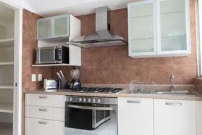 Deluxe Condo With GYM and Garden Near La Mexicana Park - Image 5