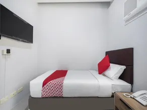 Finnex Hotel by OYO Rooms - Image 4