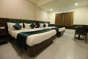 GreenOtel Room Surat - Image 2