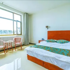 Yijie Holiday Chain Hotel - Image 5