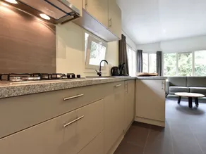 Luxury Chalet With Spacious Garden in a Natural Holiday Park in a Cycling and Walking Area - Image 4