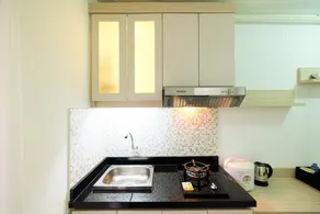 1BR with Sofa Bed at Bassura City Apartment By Travelio - Image 4