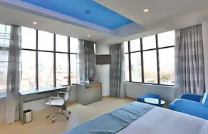 City Hotel And Suites - Image 2