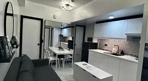 Chic and Cozy Minimalist Condo with Pool in Makati City - Image 2