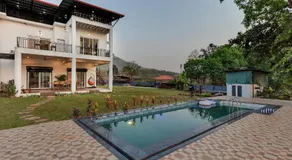 SaffronStays Deckhouse 47 - 3BR pet-friendly industrial-style pool villa with bonfire, BBQ, rain dance & celebration turf - Image 2