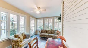 Historic downtown townhome with brick courtyard, sunroom & parking - Image 3