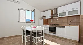 Apartments Ukić with a large outdoor swimming pool - Image 4