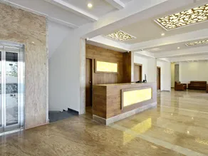 Capital O Hotel Palm International - Image 3