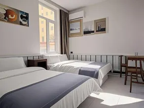 Linjiang Guanglong Business Hotel - Image 3