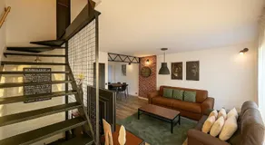 Evasion Verdoyante Vue sur jardin avec balcon et parking - Image 2
