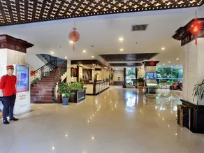 Xin Tian Le Hotel - Image 4