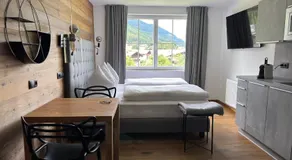 Apartamento vacacional ideal para familias con terraza y jardín | Cerca de las pistas de esquí - Image 2