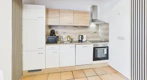 CROWN LIVING Babylon Studios Lustenau - Studios nahe Messe und Schweizer Grenze, WLAN, kostenloser Parkplatz, Self Check-in, ideal für Geschäftsreisende und Feriengäste - Image 3