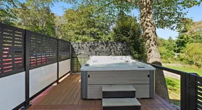 Modern Waterfront Retreat with Hot Tub & Pond Views - Image 4